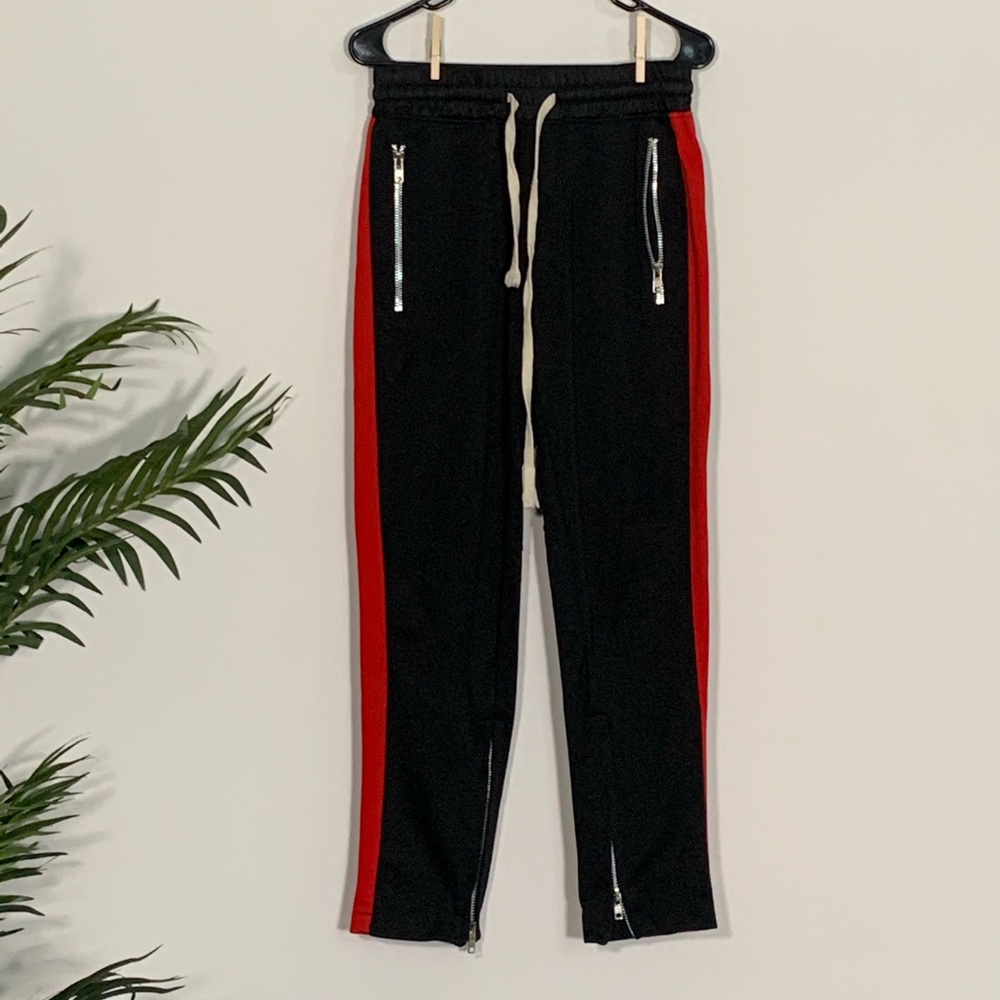 Track pants with red side stripe